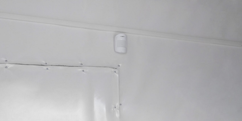 MotionProtect above the entrance to the isolated climatic zone of the greenhouse