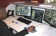 Multiple monitors for concierges allow them to watch video from all over the complex at once