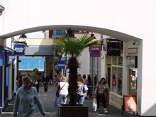 The main focus of the surveillance system is on the central passage of Wharfside Shopping Centre