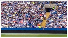 Blurry CCTV image of a stadium