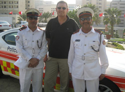 Julian Cooke, International Sales Manager at TSS with Bahrain traffic officers