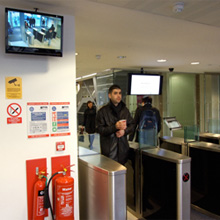LCD displays show live camera coverage at main entrances
