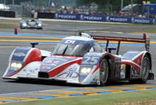 The finishing line beckons for AD Group’s CEO Mike Newton in the Lola LPD racecar at the Le Mans 24 Hours