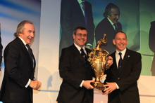 Sir Jackie Stewart OBE at the BRDC Awards with Mike Newton and Andy Wallace holding the Woolf Barnato Trophy'