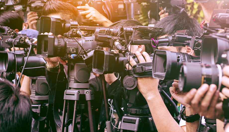 How do news reports influence opinions about security?